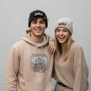 Couple wearing Jalil knitted beanies outdoors in winter fashion